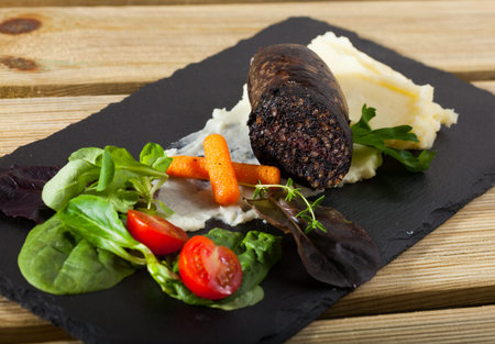 Blood sausage with vegetablesの写真素材