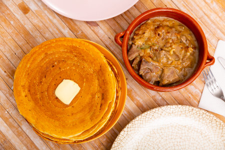 Machanka and pancakes - Belarusian cuisine, traditional assorted dishes closeupの写真素材