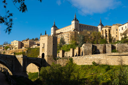 Landscape with a view of the Alcantara Bridge and the Alcazar de Toledo Castleの写真素材