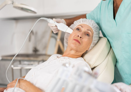 doctor uses skin scrubber
