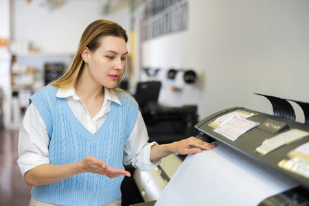 Woman working in publishing facility
