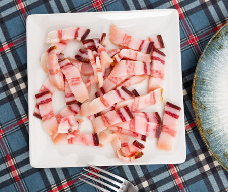 Pieces of lard served on plateの写真素材