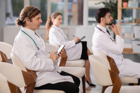 Lecture or meeting medical participants listen to speakerの写真素材