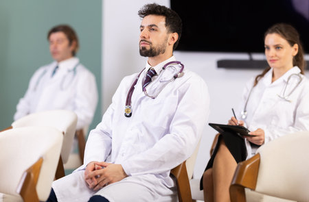 Lecture or meeting medical participants listen to speakerの写真素材