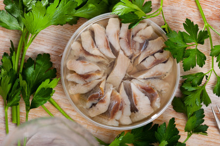 Sliced pickled herring fillet in oil