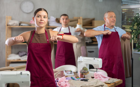 Tailors do a warm-up in the workshop