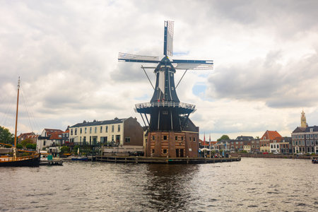 North Holland, Haarlem, Spaarne river canal and de Adriaan windmillのeditorial素材