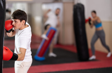 Guy boxing in training
