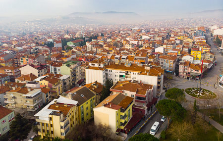 Aerial view of Balikesir cityscape in foggy winter day, Turkey
