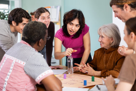Group of people playing board game