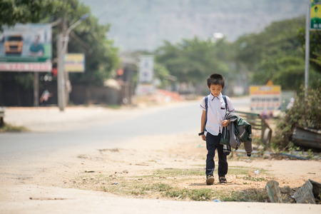 MUI NE - VIETNAM, APRIL 20 : Student were walking come back from school in mui ne, April 20, 2015のeditorial素材