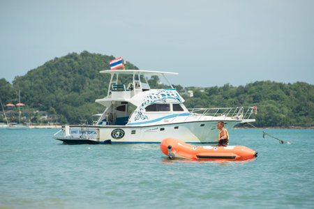 SAMUI - THAILAND, JULY 26 : Tourists sit on a rubber boat at samui islands, July 26, 2015
