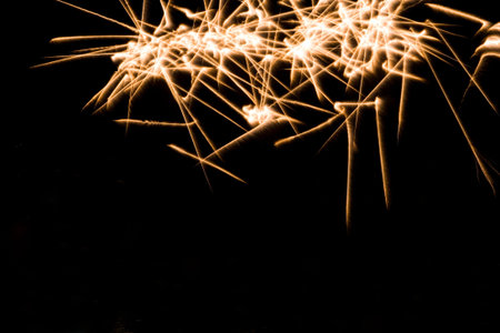Green colorful fireworks in black background