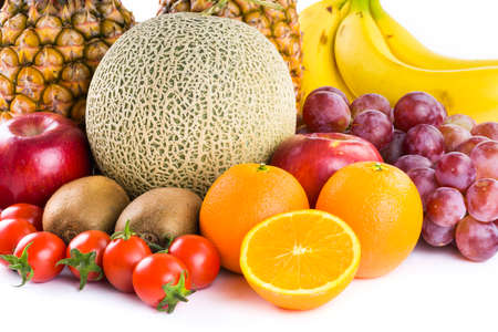 many kinds of fruits on a bright background, such as apples, bananas, pineapples, oranges, etcの写真素材
