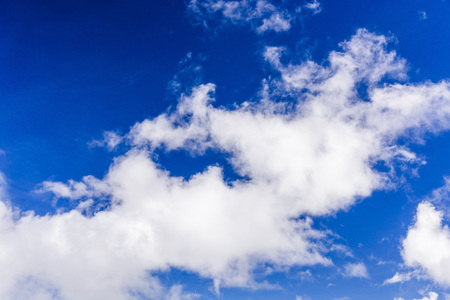 Blue sky with cloudsの写真素材