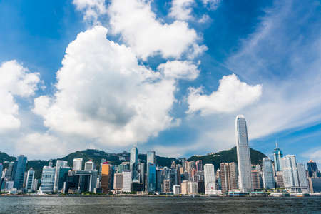 Panoramic cityscape view from Victoria Harbour in Hong Kong. International Finance Center(IFC)のeditorial素材