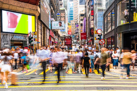 View of office & commercial buildings in the Central area in Hong Kong, China. The central area is the main commercial district of Hong Kong. Pedestrians in Central Hong Kong.のeditorial素材