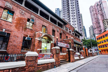 Capture the front architecture of an old style red brick landmark building of Chinese YMCA of Hong Kongのeditorial素材