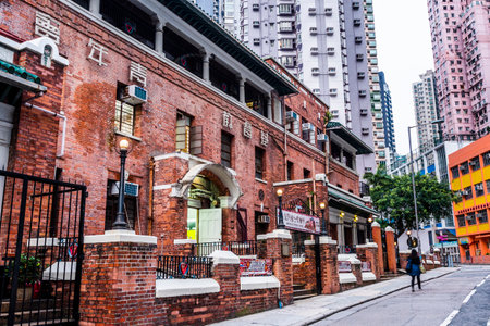 Capture the front architecture of an old-style red brick landmark building of the Chinese YMCA of Hong Kongのeditorial素材