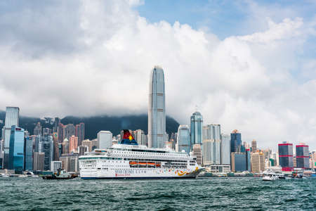 view of a large cruise ship sailed into Hong Kong's Victoria Harbour in china.のeditorial素材