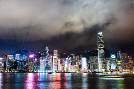 panoramic view of West Kowloon and Victoria Harbour in Hong Kong at night.のeditorial素材