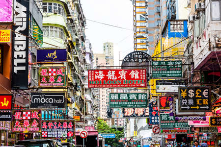 Street Signs at Mongkok, Kowloon. Hong Kong is known for the myriad of neon lights located above the roadwaysのeditorial素材