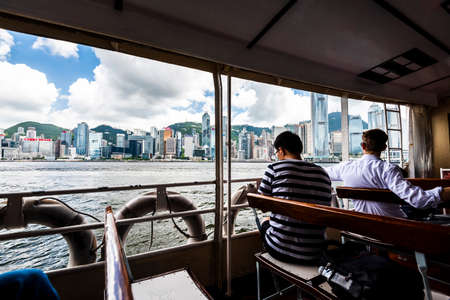 Hong Kong Star Ferry, passenger on the upper deck of a Star Ferry.のeditorial素材