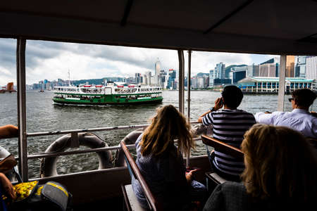 Hong Kong Star Ferry, passenger on the upper deck of a Star Ferry.のeditorial素材