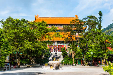 Main hall of Po Lin Monastery, Hong Kong. The text above the door reads Daxiong Baodian, meaning Hall of Great Strength.のeditorial素材