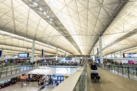 Arrival Hall in Hong Kong International Airport in Hong Kong, China. It handles more than 70 million passengers per yearのeditorial素材