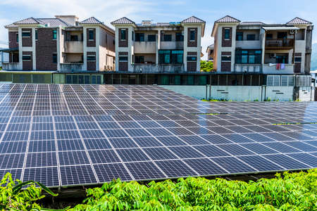 solar panels photovoltaics energy in power station against blue sky alternative renewable energy from the sunの写真素材