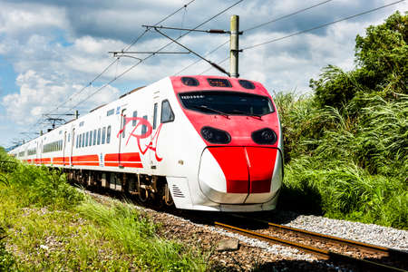 Tze-Chiang Limited Express(Puyuma) train through the beautiful countryside of Hualien, Taiwanの写真素材