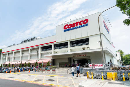 view of Costco wholesale storefront in Kaohsiung, Taiwan. Costco Wholesale Company is the largest membership warehousing club in the United States.のeditorial素材