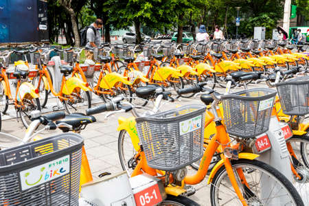 U-bike is a popular commuting method in the metropolitan area in Taiwan for both tourists and citizens and is also the paradigm of the rental bike of shared economics.のeditorial素材