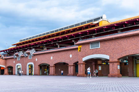 Passengers come to take MRT at Tamsui station, New Taipei, Taiwan. Tamsui station is the northernmost metro station in Taiwan.のeditorial素材