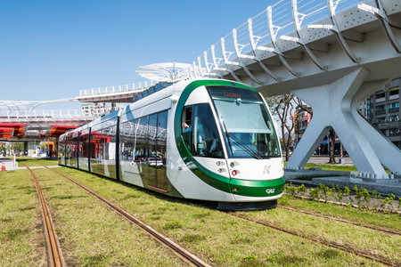 cityscape of light rail train and the metropolitan building in Kaohsiung, Taiwan. The light rail system in Kaohsiung is the first light rail transit in Taiwan.のeditorial素材