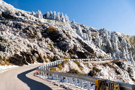 Snow and ice of Taiwan's Hehuanshan covered forests and asphalt roads. Taroko National Park is one of Taiwan's most popular tourist attractions.の写真素材