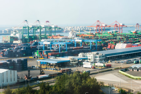 Look over Containers and cranes along the coast of Taichung Port in Taiwan. It is the second-largest port in Taiwan after Kaohsiung Port.のeditorial素材