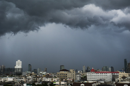 Aerial view of Bangkok city, under blue storm cloudy skyの写真素材