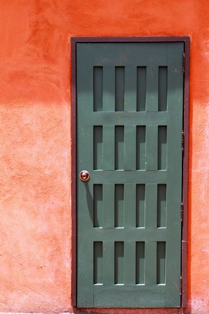 A wooden green door の写真素材