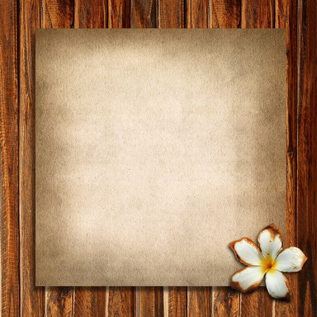 Old paper and plumeria with wood backgroundの写真素材