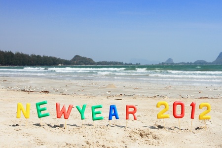 Alphabet  forming the word newyear and sea view backgroundの写真素材