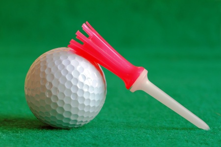 Golf Ball on the Green Grass の写真素材