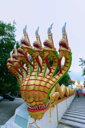 Big Buddha Temple has a large golden Buddha statue on top of the hill in Chonburi province in Thailand.の写真素材