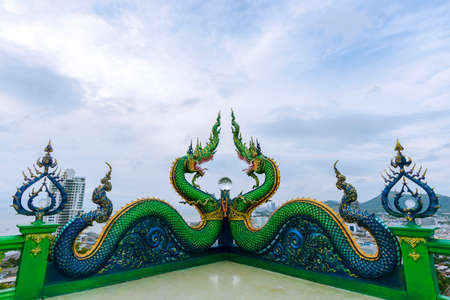 Naga statue and beautiful crystal ball in Chonburi, Thailandの写真素材