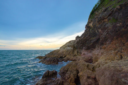 Beautiful sea and mountain views under the bright blue sky.