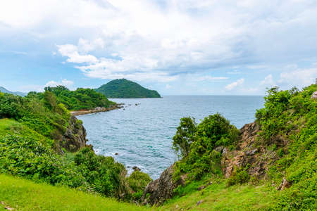Beautiful sea and mountain views under the bright blue sky.の写真素材