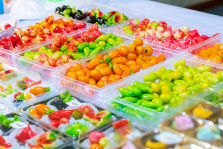 Beautiful Thai desserts placed on a tray with a blurred backgroundの写真素材