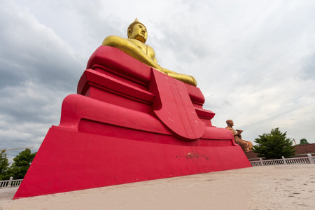 Large beautiful buddha statue "Luang Pho Sothon" at Wat Bot, which is an important tourist attraction in Pathum Thani Province in Thailandのeditorial素材