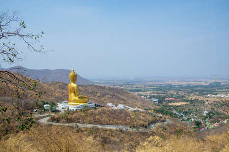 Big Buddha statue on the mountain Under the blue skyの写真素材